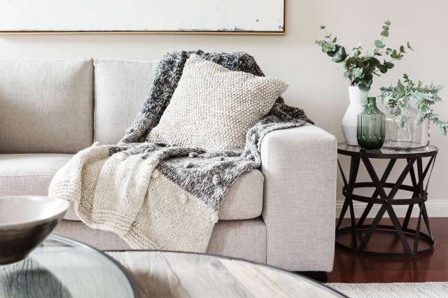 Maximizing Seasonal Sophistication with Strategic Throw Pillow Arrangements